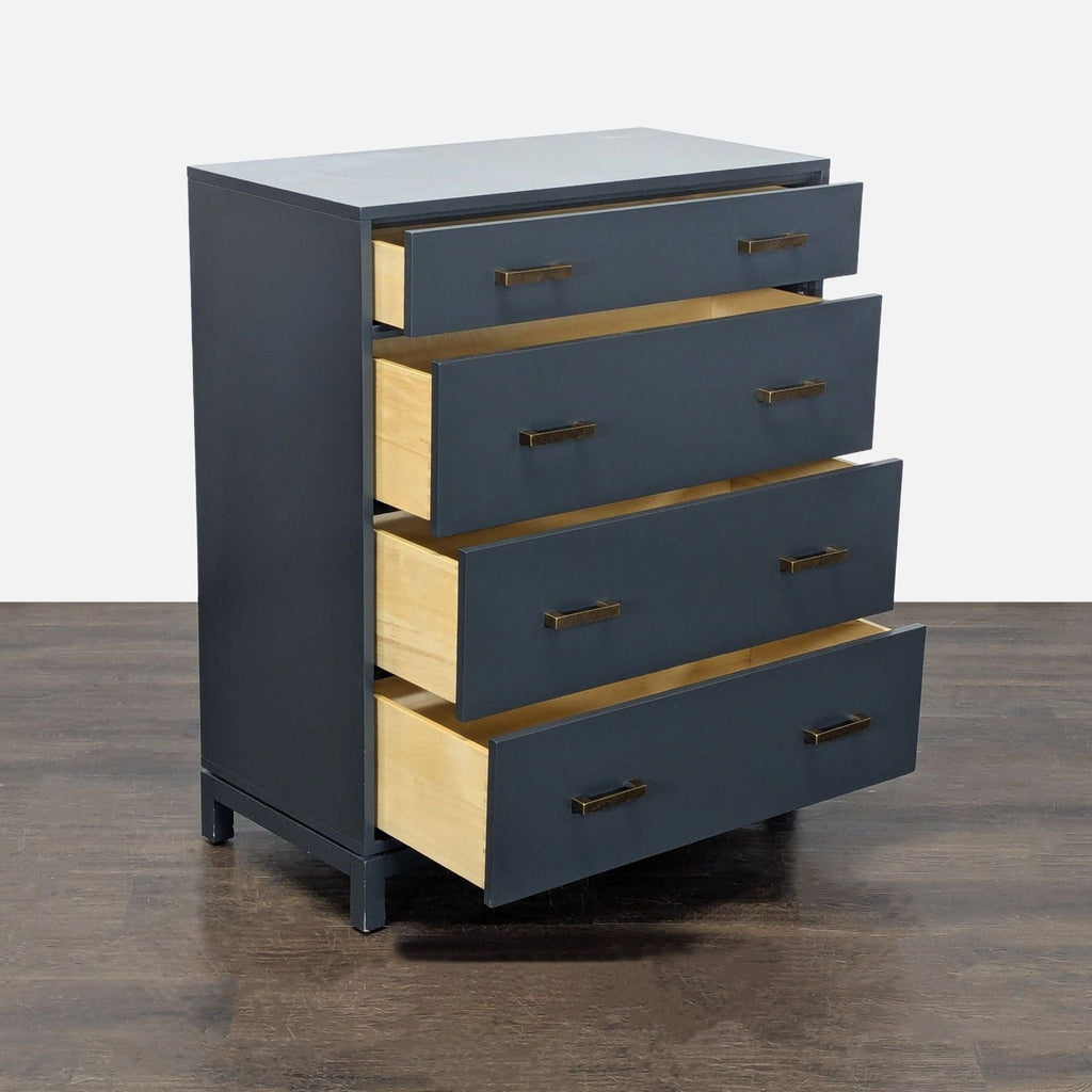 Modern dresser by The Land of Nod featuring spacious drawers, smooth glides, and elegant brass hardware.