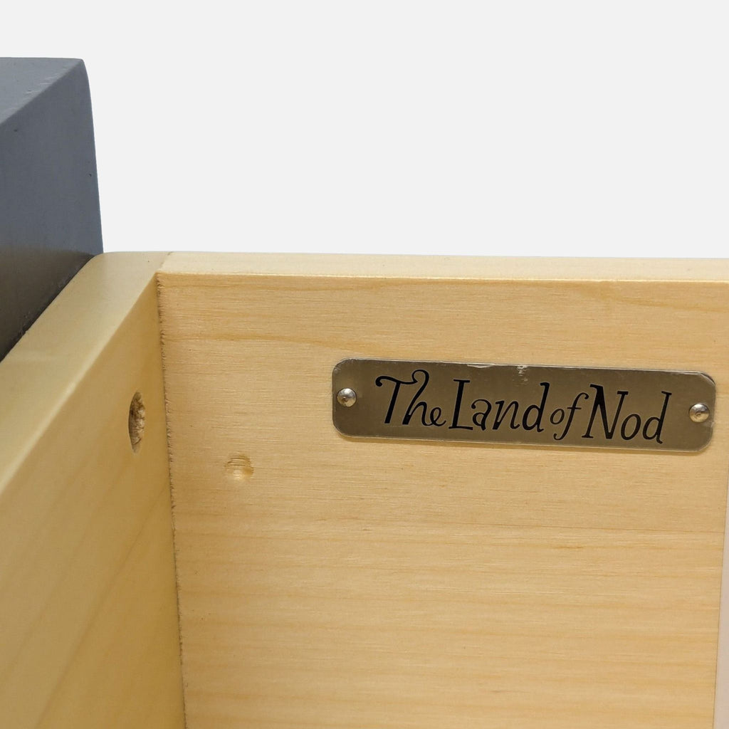 The Land of Nod Cargo Modern 4-Drawer Dresser with Brass Handles