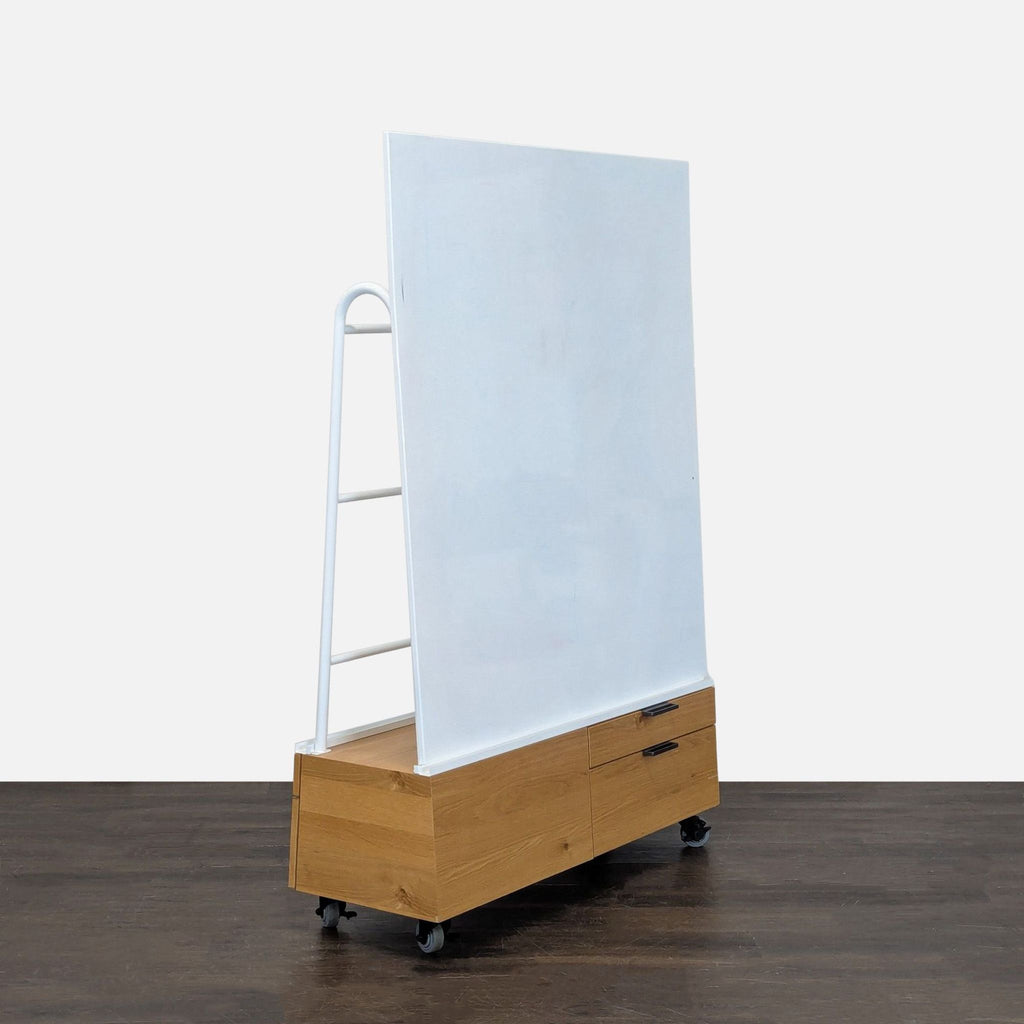 Mobile office whiteboard with wooden base and drawers, offering storage and easy movement for workspace use.