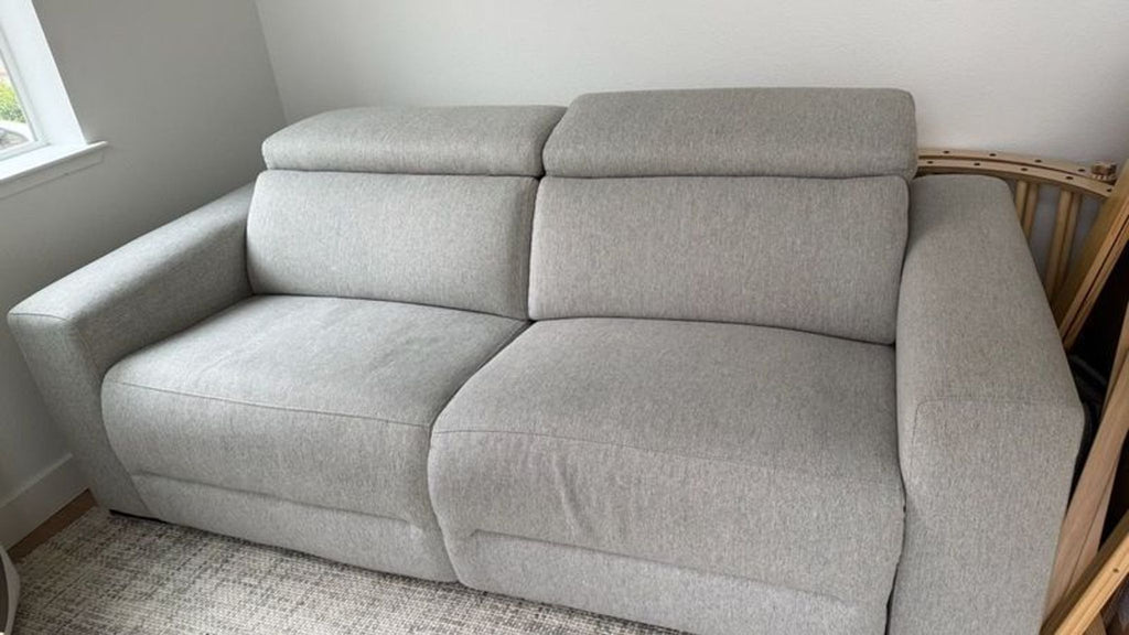 2. Reperch brand light gray sectional sofa with plush cushions and upright backrests, neatly arranged.