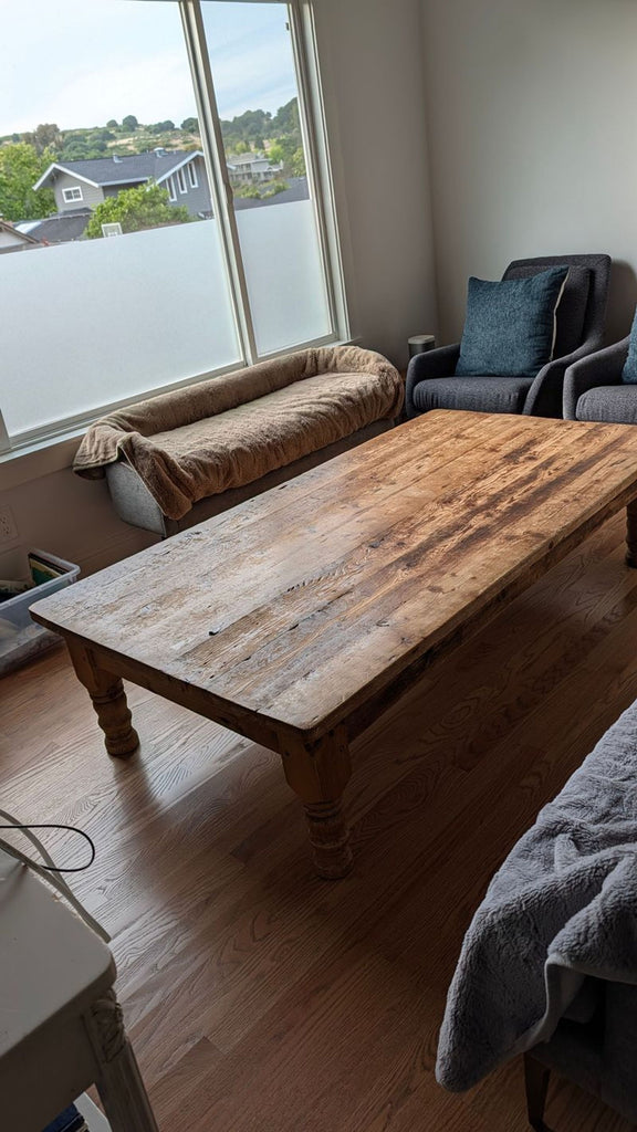 Antique pine coffee table with a rectangular top and rustic finish, measuring 38" by 72" by 17" high.  