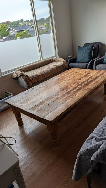 Antique pine coffee table with a rectangular top and rustic finish, measuring 38" by 72" by 17" high.  