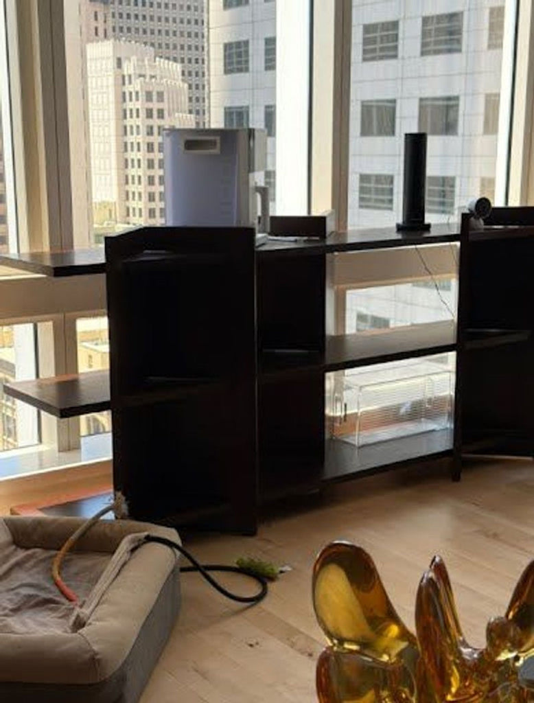 2. Modern side console table made from brown oak, featuring a slim profile and clean lines, by CB2 Sommet.  