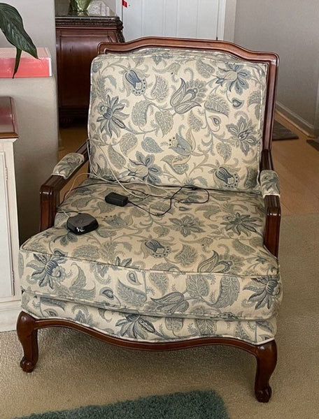 a chair with a guitar on it 