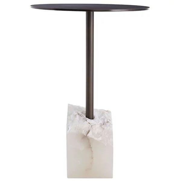 1. Reperch side table featuring a round black top, slim metal stem, and chunky white stone base.  