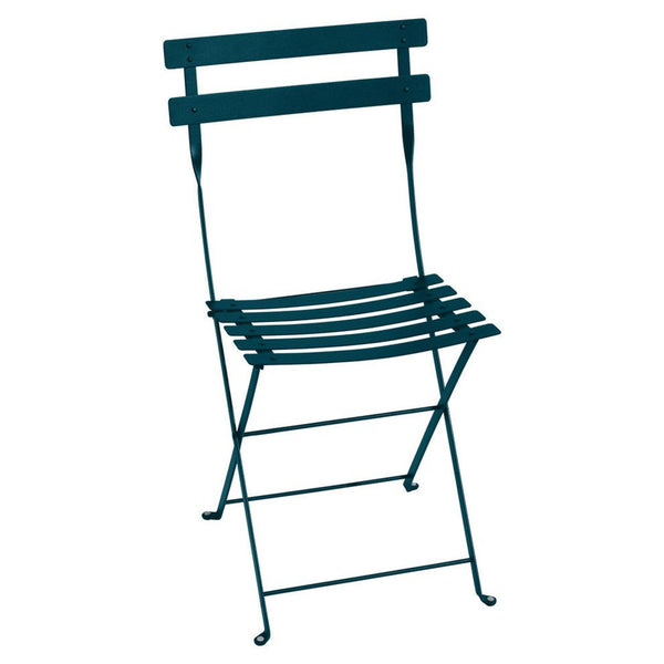 Folding metal dining chair in dark blue.