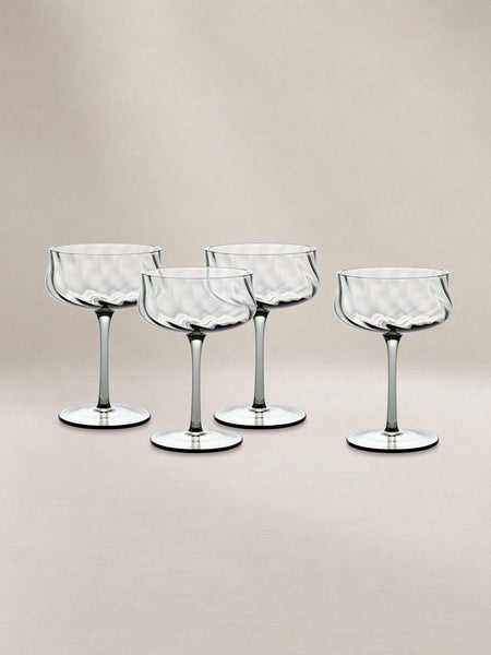 Certainly! However, I don't see any images or specific details about the item besides its category, "Glassware." Here are three distinct, general-purpose alt texts for an unspecified glassware image. If you provide an image or more details, I can tailor the alt text further.