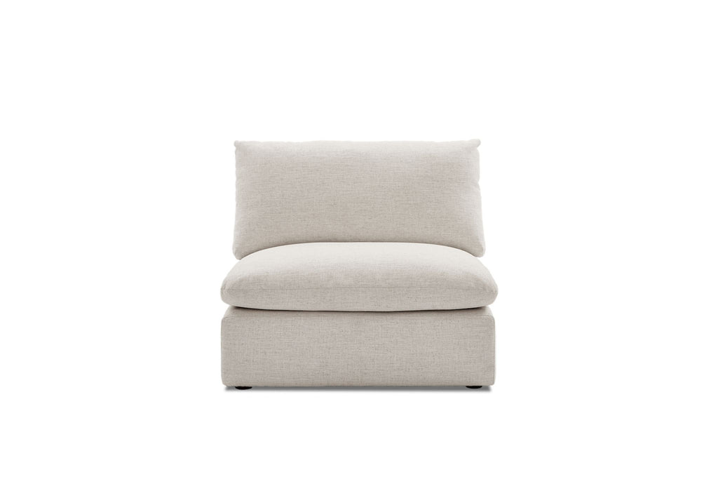 1. Front view of a light beige Castlery sectional seat with plush back and seat cushions.