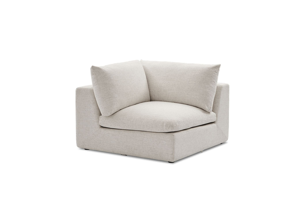 A Reperch brand sectional corner seat in light beige fabric with plush cushions and a minimalist design.