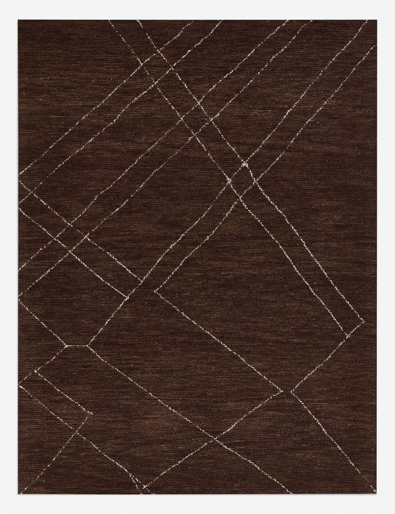 the rug collection brown area rug with white geometric pattern