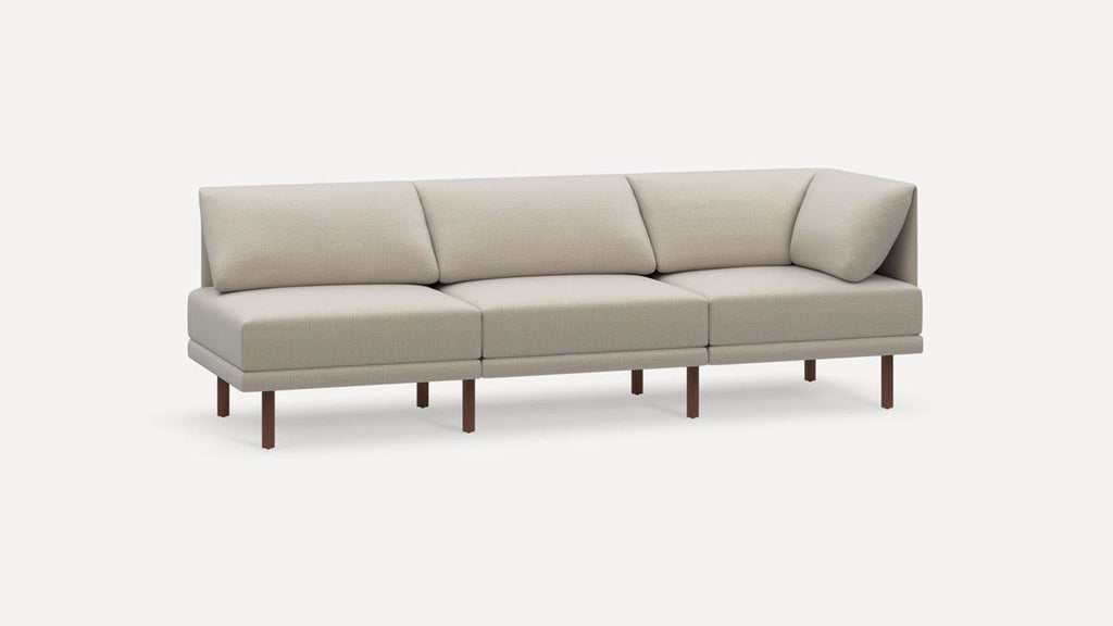 2. Angled side view of a Reperch brand 3-seat beige sofa, featuring clean lines and a modern look.