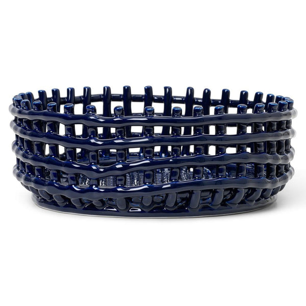 Dark blue ceramic centerpiece with a woven basket design, perfect for serving fruit or bread.