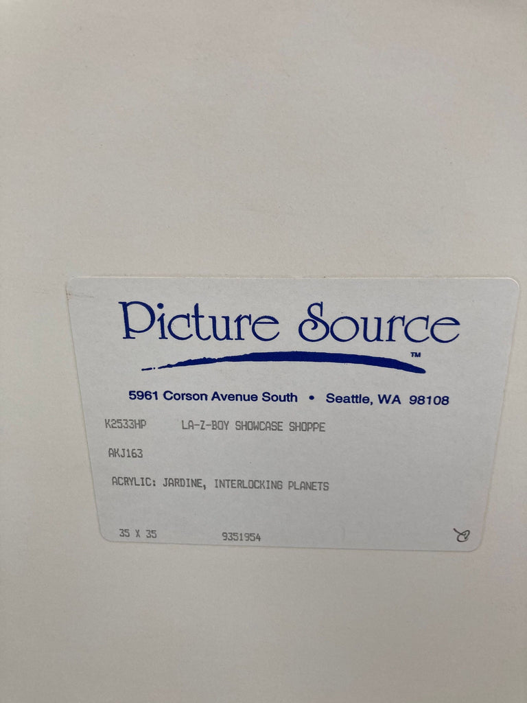 3. Close-up of label on back of Reperch art, reading: “Acrylic: Jardine, Interlocking Planets, 35 x 35.”