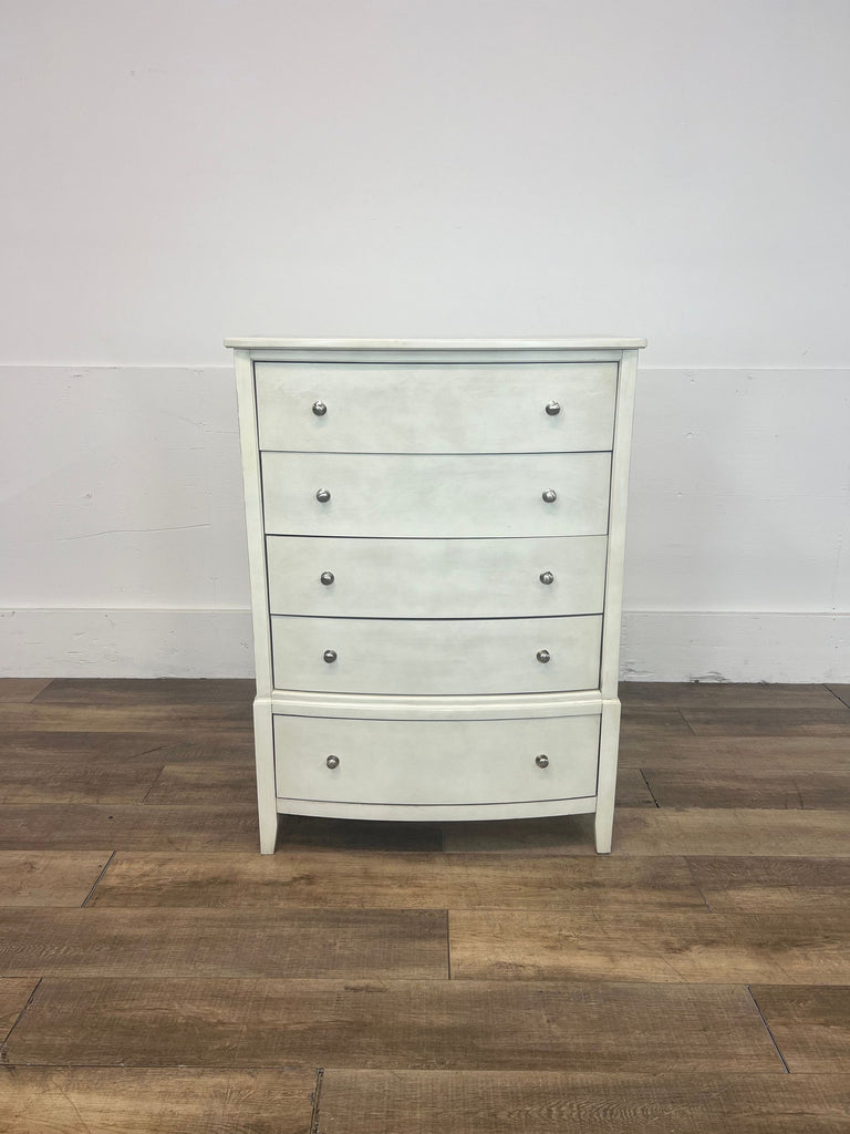 a french country dresser with a white painted finish.