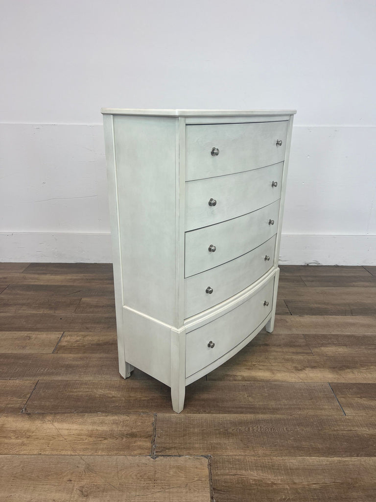 a french country style dresser with a white painted finish.