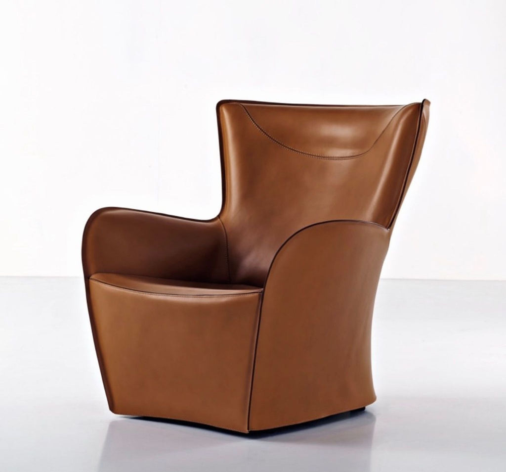 Molten & C 2015 Mandrague Swivel Chair; sleek, modern lounge seat with a curving profile and minimalist style.