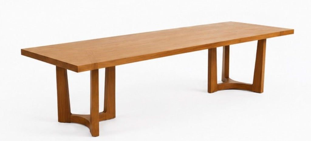 Sleek wooden coffee table from 2015 by Holly Hunt, shown with smooth circular top and sturdy base.