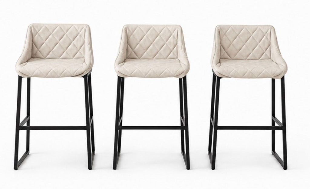 Modern Kekke counter stools by Piet Boon, featuring minimalist design, sturdy legs, and plush seat upholstery.  
