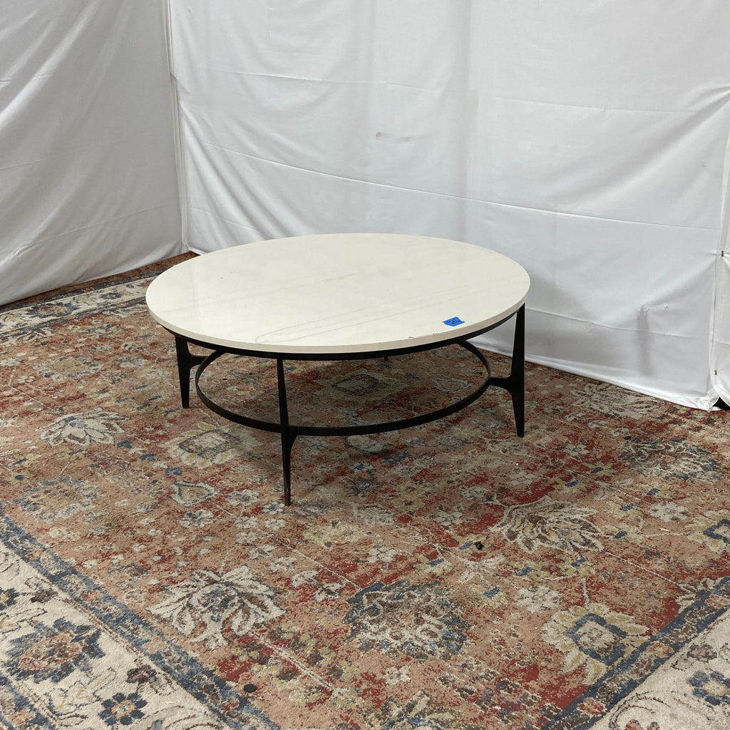 a [ unused0 ] coffee table with a glass top.