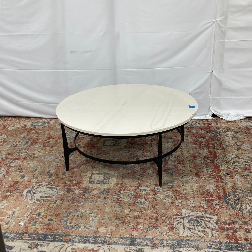 a [ unused0 ] coffee table with a marble top, circa 1970.