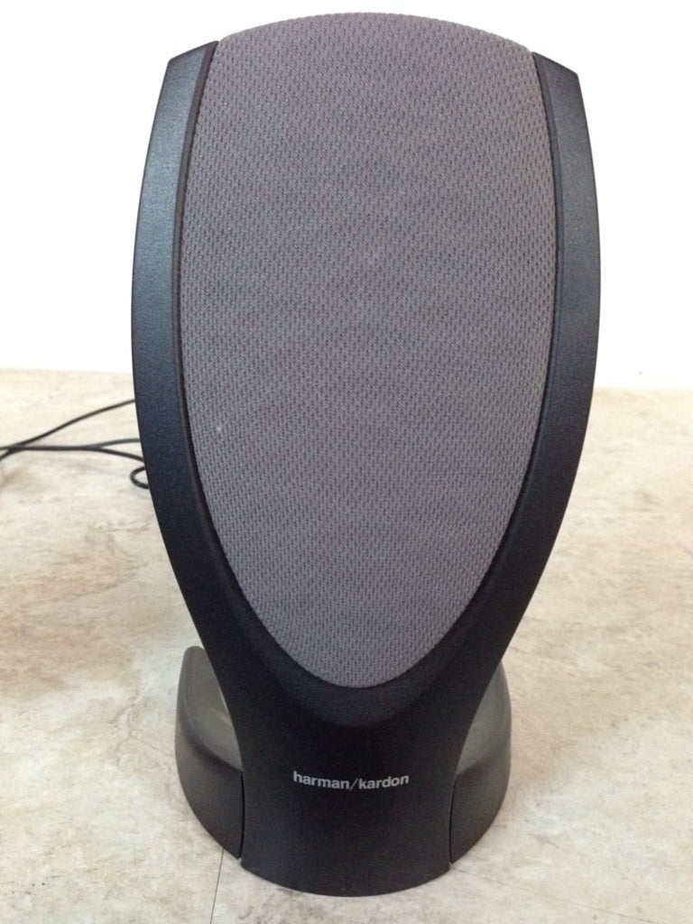2. Single Harman/Kardon speaker from the audio equipment category, shown close-up with a visible logo and cord.