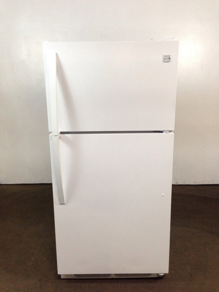 Front view of a white Kenmore full size refrigerator with freezer, featuring two doors and simple handles.