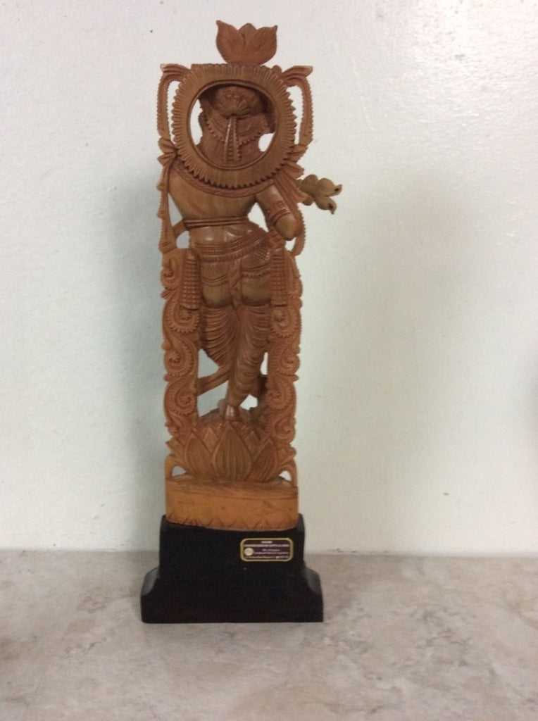 3. Decorative Indian statue on a pedestal, created by Singiri Chandrasekhar Gupta & Sons, finely detailed carving.