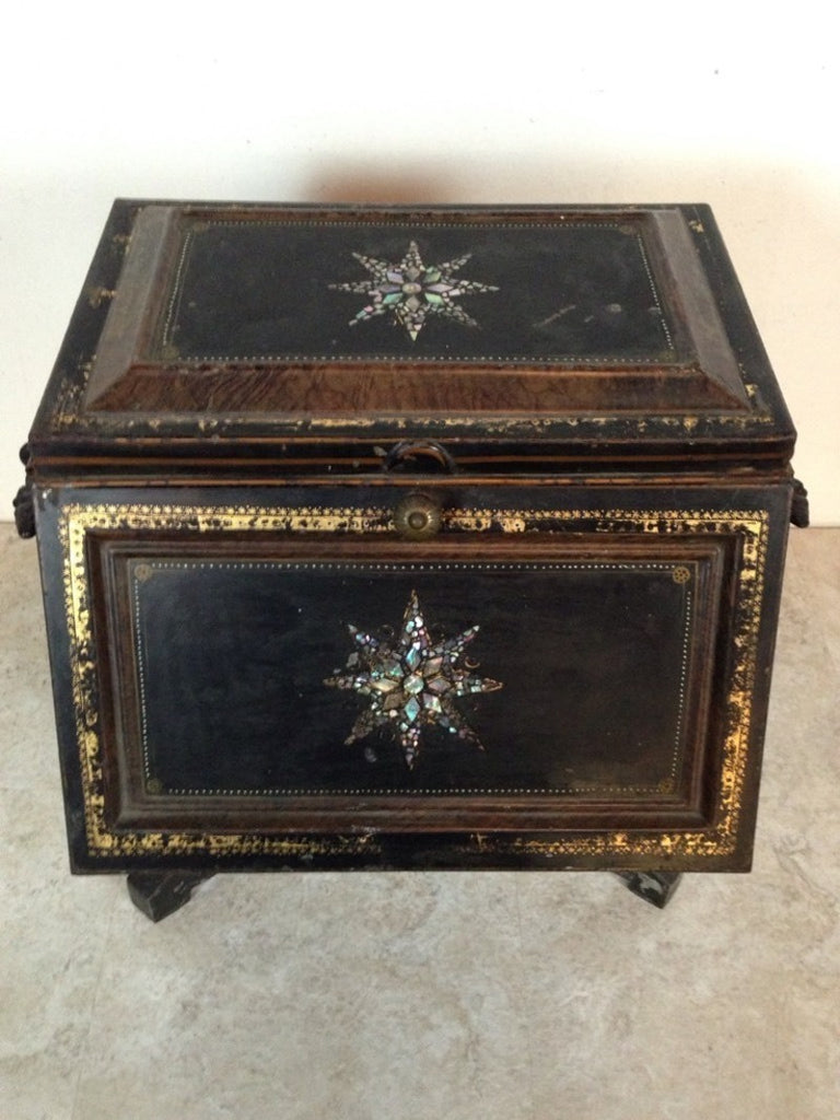 1. Ornate black Reperch trunk with mother-of-pearl inlay, side mail slot, and decorative handles, viewed closed.