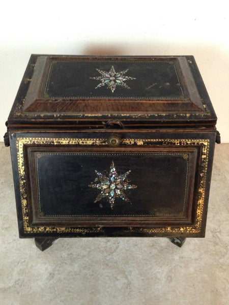 1. Ornate black Reperch trunk with mother-of-pearl inlay, side mail slot, and decorative handles, viewed closed.