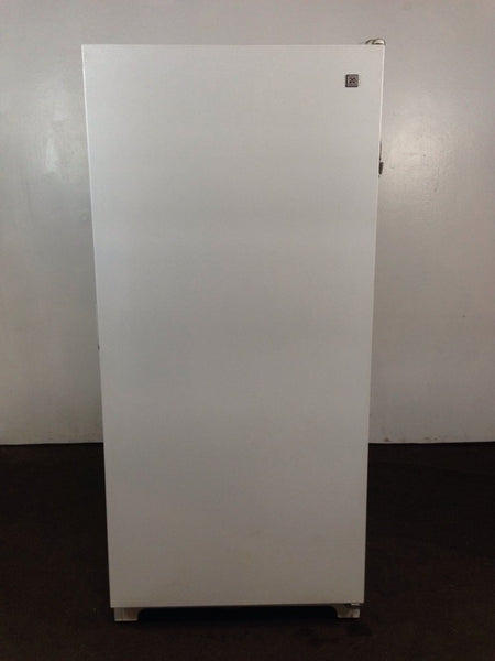 1. Front view of a Kenmore 20 Frostless refrigerator with a plain white exterior and minimal design.