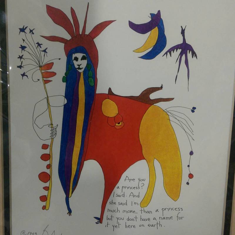 2. Close-up of a StoryPeople print with whimsical watercolor art, handwritten text, and vivid primary colors, unframed.