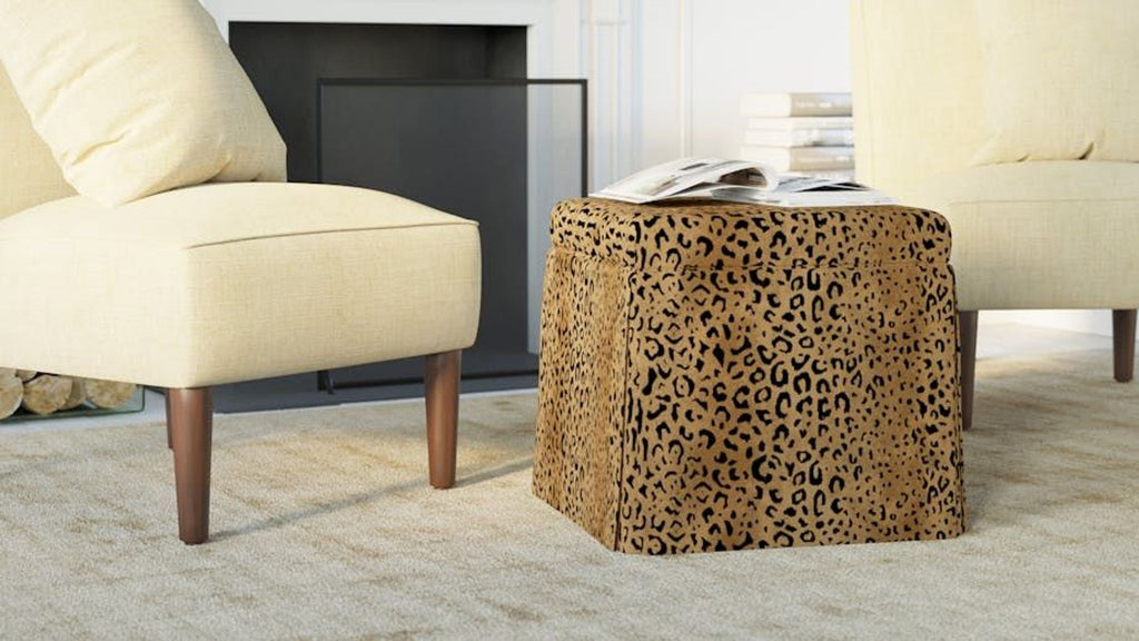 a leopard print side table in a living room.