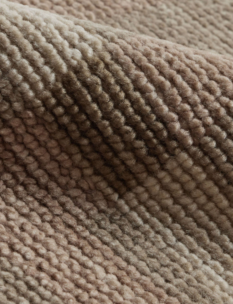 a close up of a pile of woolen fabric.