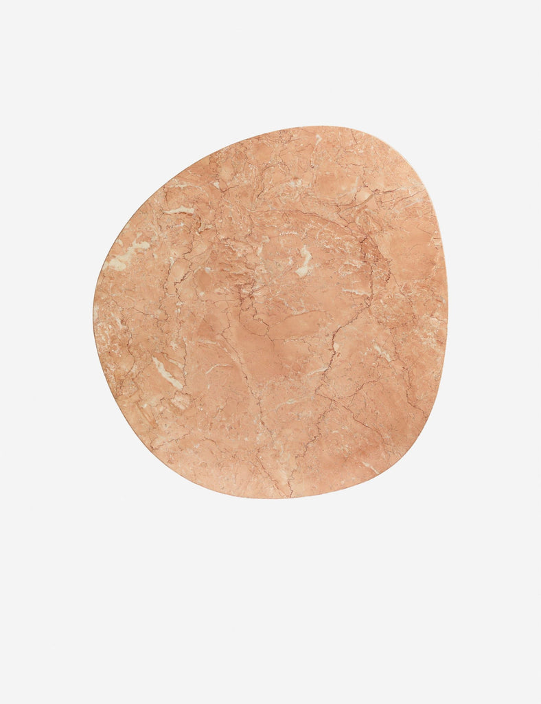 Top view of a Reperch coffee table, showing its asymmetrical, rounded pink marble surface.