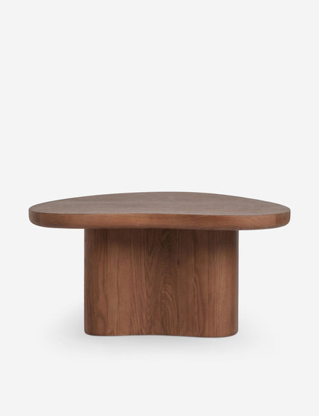 Front view of a Reperch coffee table with an organic, rounded wooden design and solid curved base.  