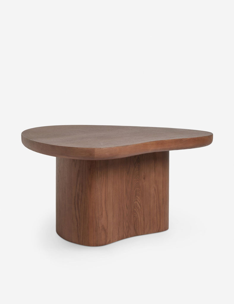 Angled side view of the Reperch coffee table, highlighting its unique asymmetrical wooden top and sturdy base.  