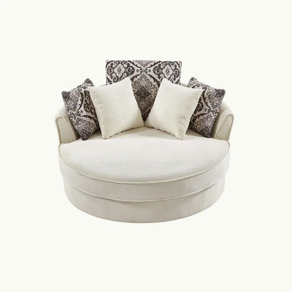 Contemporary barrel chair with corduroy upholstery and removable pillows on a swivel base.