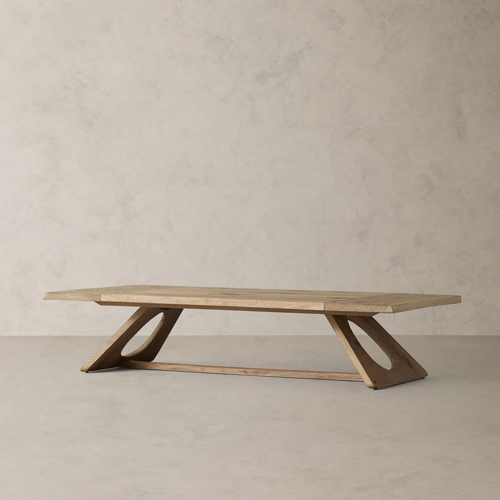 the coffee table is made from a solid wood.