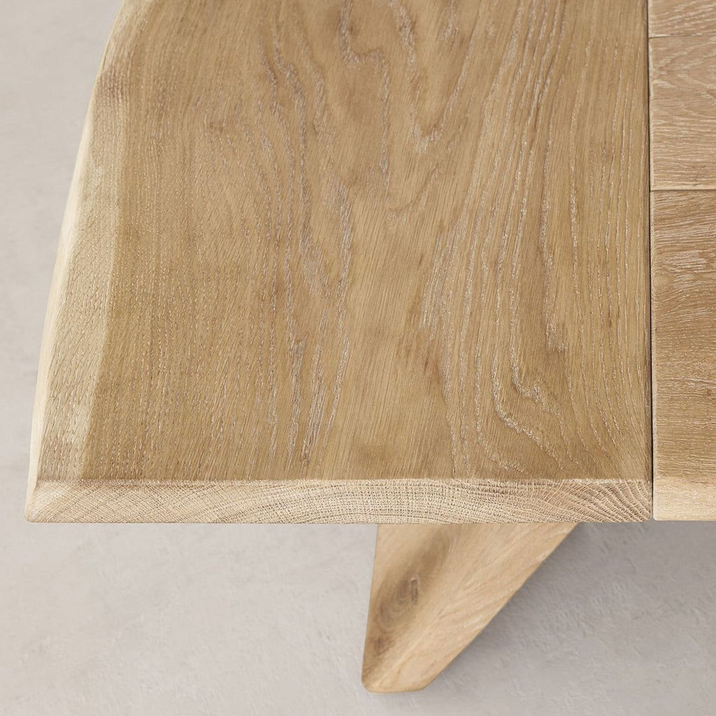 the coffee table is made from solid oak with a natural finish.