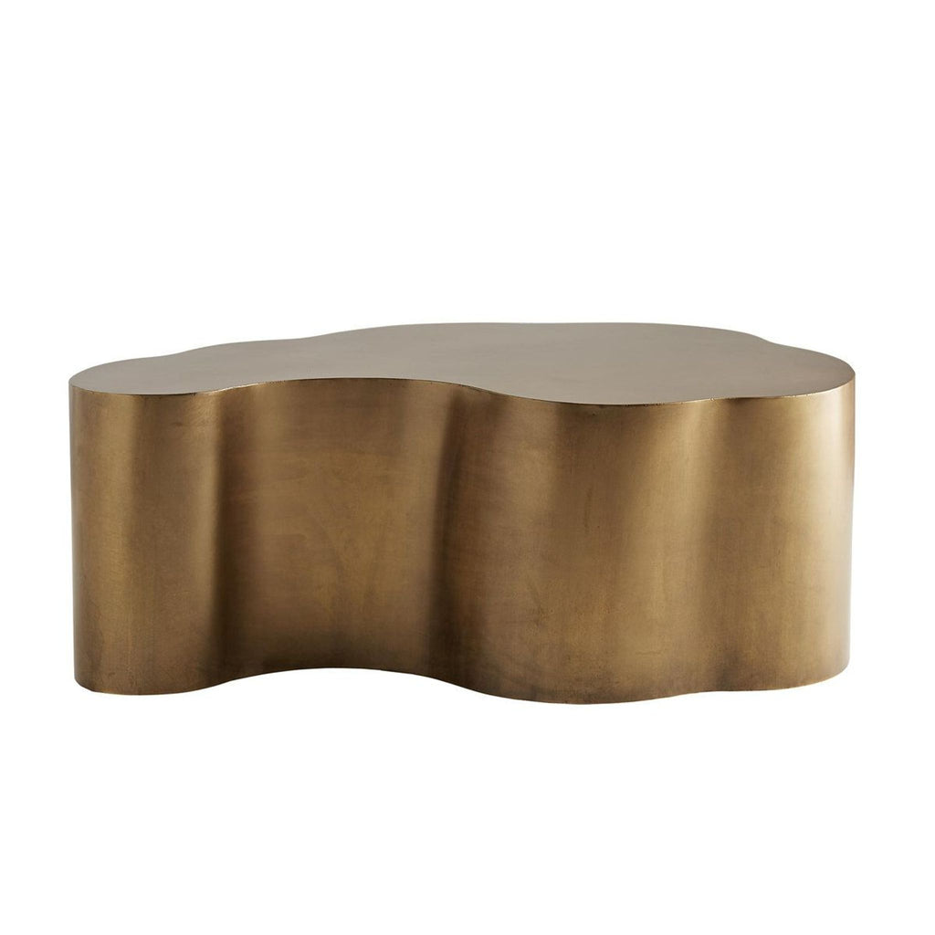 2. Reperch coffee table with a unique bronze gold hue, curved silhouette, and smooth, reflective surface.  