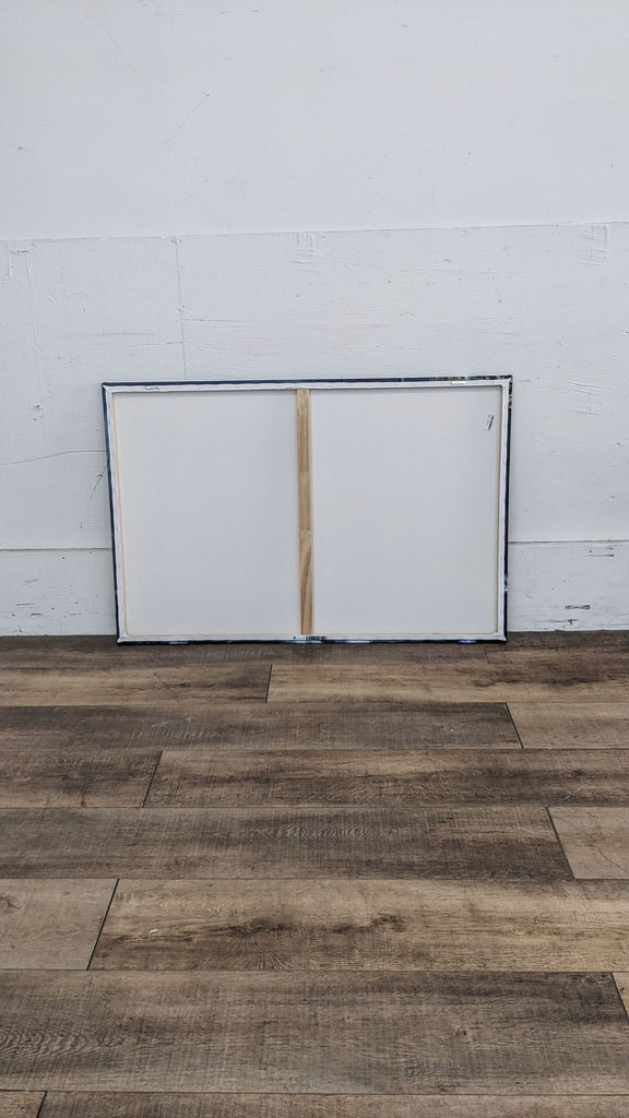 Back view of the stretched canvas art print, showing wooden frame.