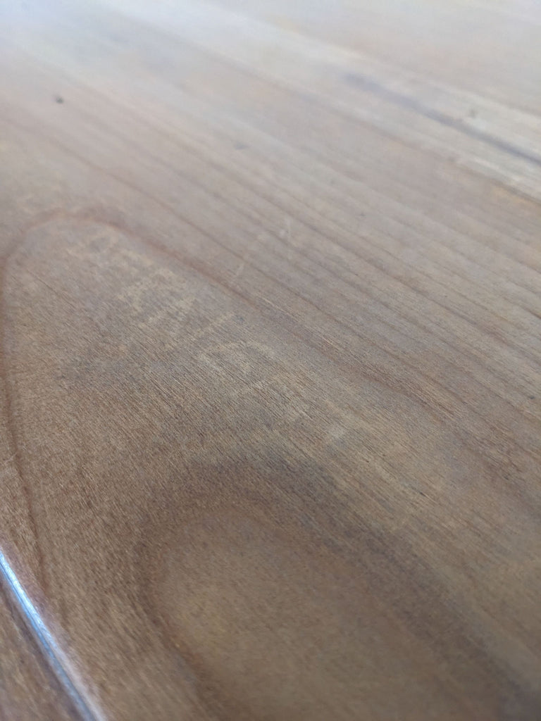 the wood grain is a very light brown color.