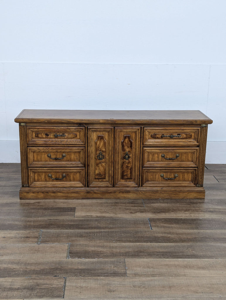 a large, antique, antique, antique, solid wood sideboard with a drawer and a drawer