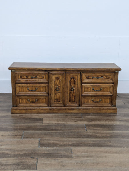 a large, antique, antique, antique, solid wood sideboard with a drawer and a drawer