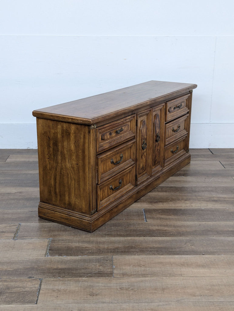 a large oak dresser with drawers