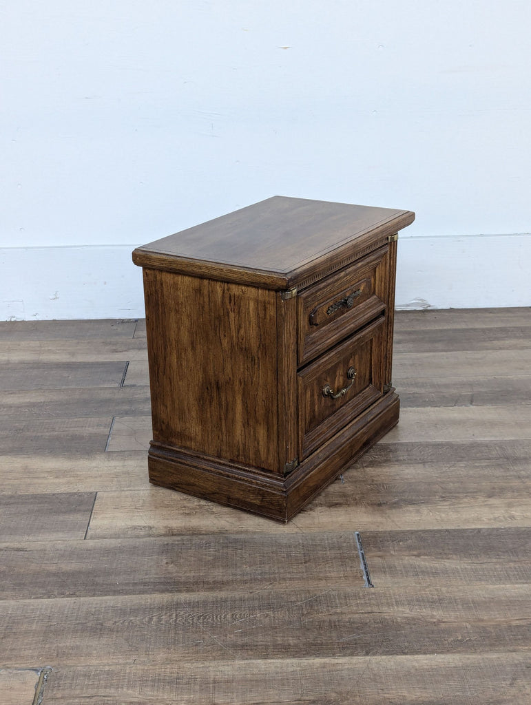 a vintage mid century modern bedside table