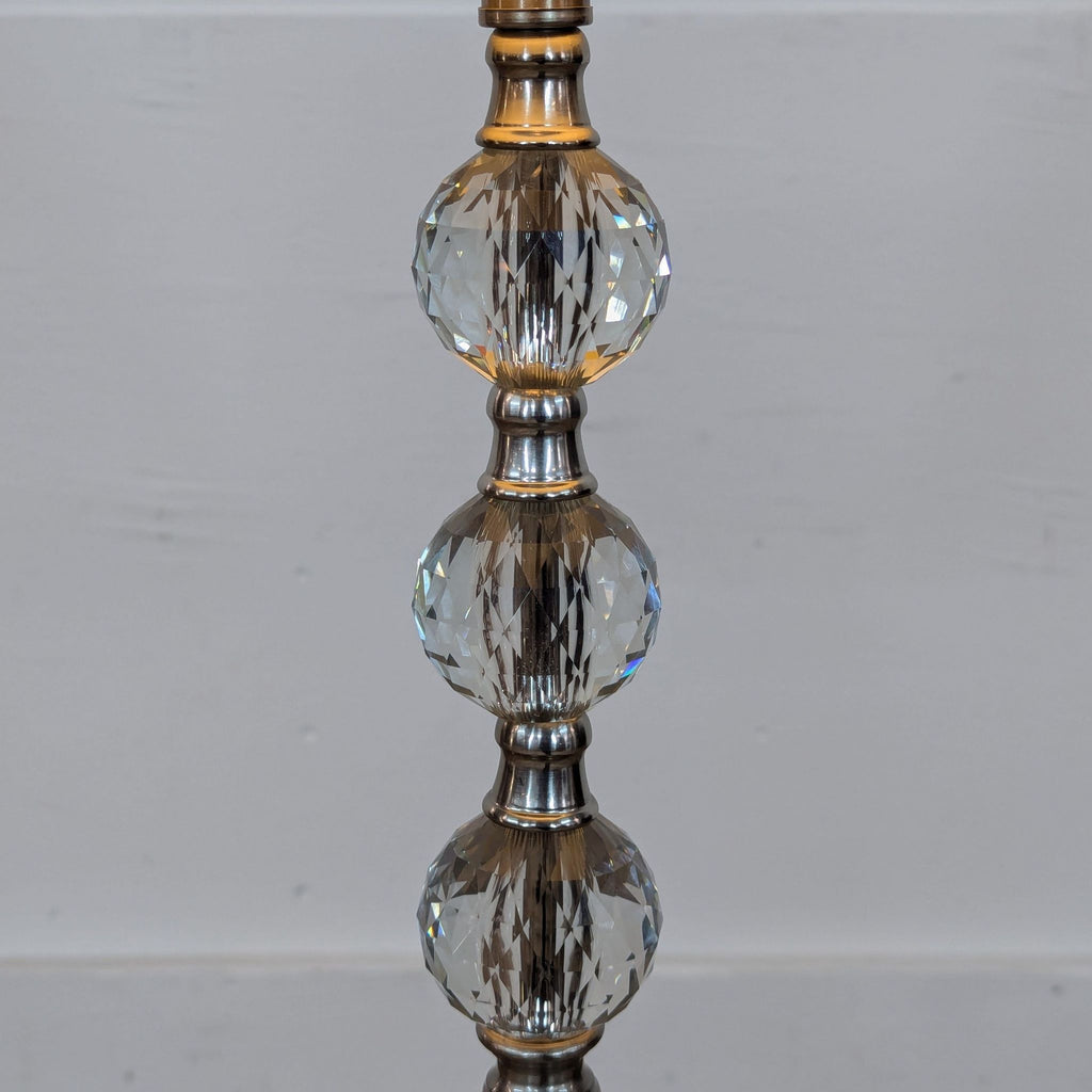 Close-up of decorative crystal spheres on Reperch lamp.