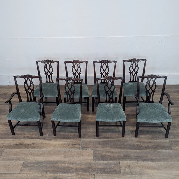 Set of 8 Chippendale-style dining chairs by Reperch, featuring carved backs and velvet seats.
