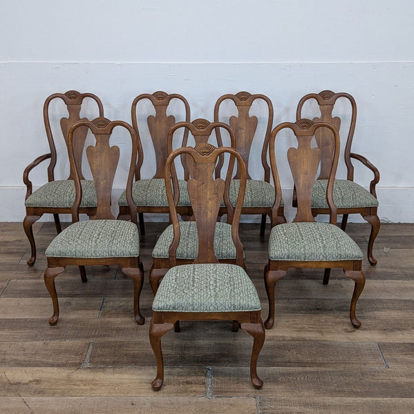 Set of Drexel Heritage dining chairs with wooden frames and patterned green cushions.