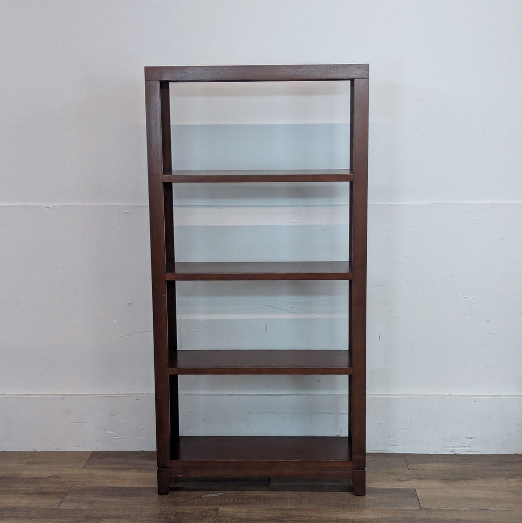 Contemporary dark oak bookshelf with 4 fixed shelves.